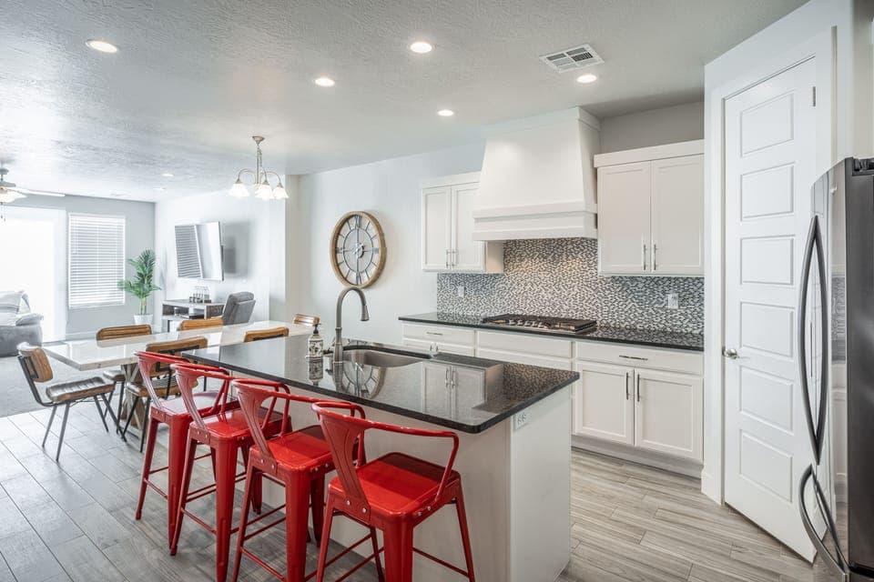 Kitchen island view - The Kitchen Island comfortably seats 4 adults and creates a great space for serving and preparing meals.