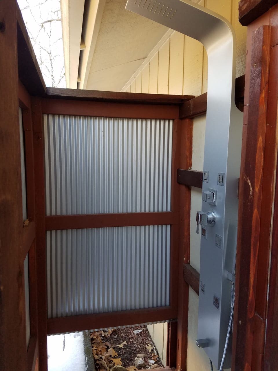 Outdoor Shower with with rainfall faucet.