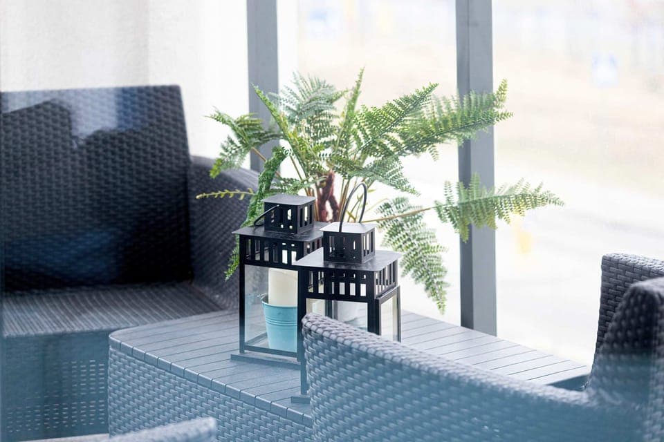 The balcony's stylish design ensures a pleasant stay. 