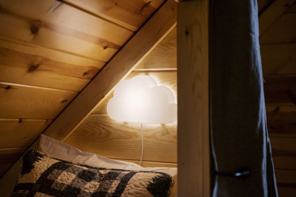 Kids wall light in built in twin bed