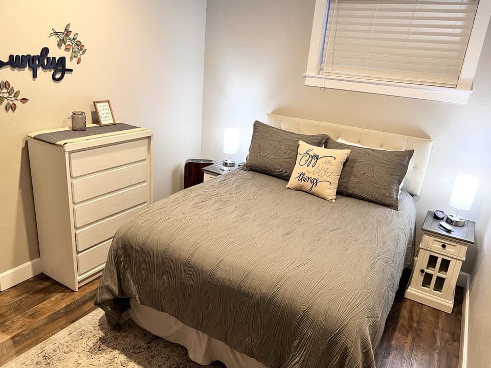 Queen adjustable bed with dual heated mattress pad, and air purifier.