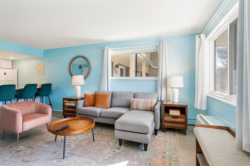 Sink into the soft sectional and enjoy the cheerful welcoming energy 