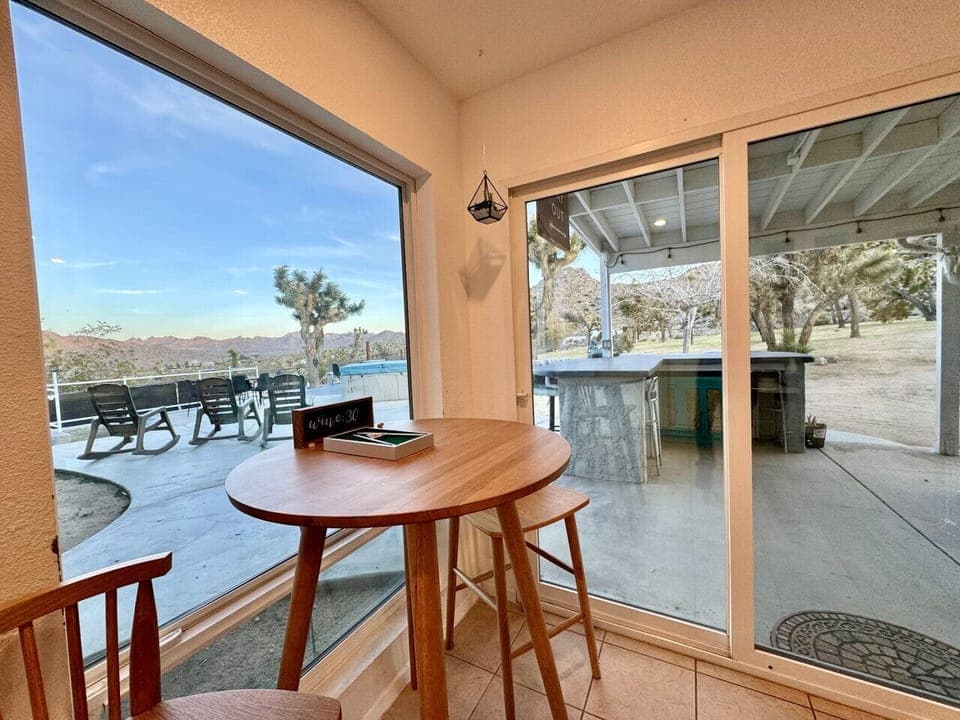High Top Dining Area and Chairs with View of Patio