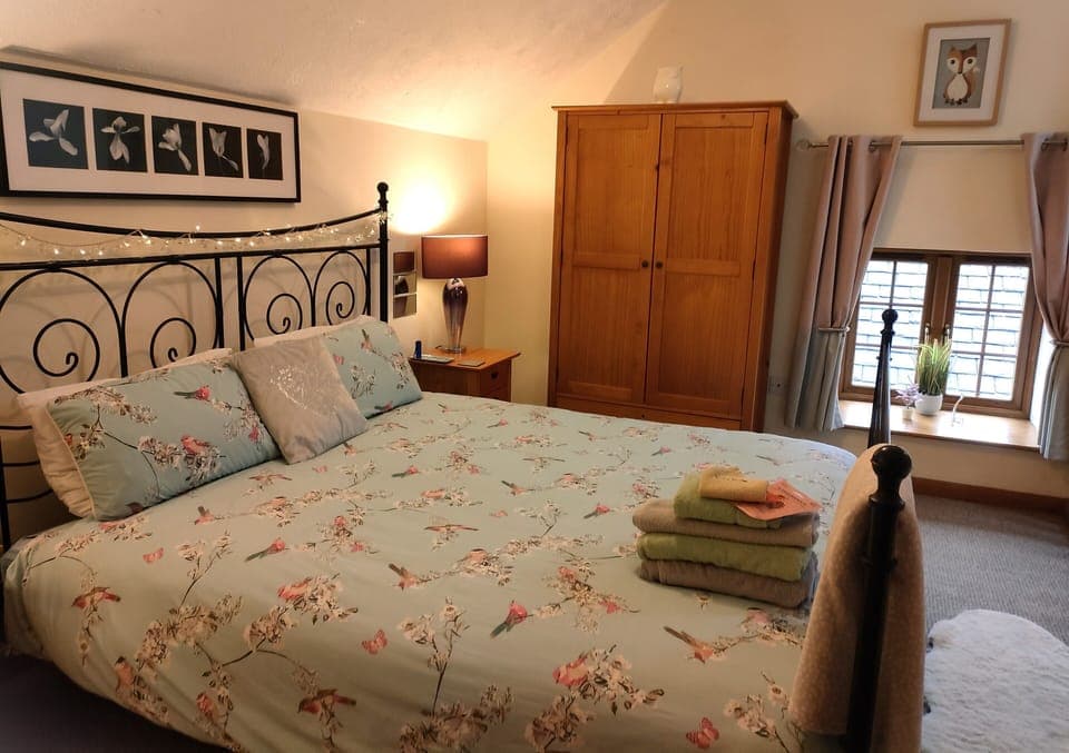 Vaulted ceiling with sky lights make this room so light and airy.