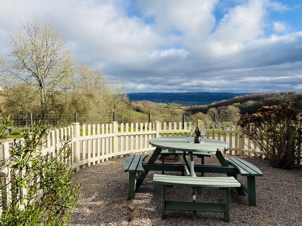 Beautiful views of the rolling countryside from the private, enclosed garden.