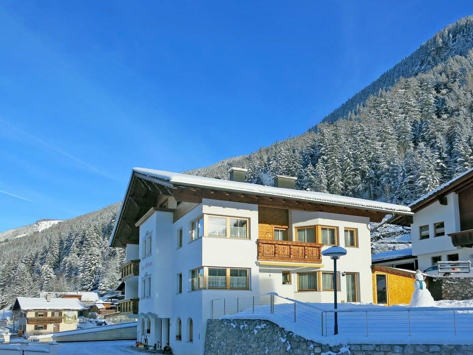 Sky, Building, Property, Window, Mountain, Blue, Snow, Slope, House, Cloud