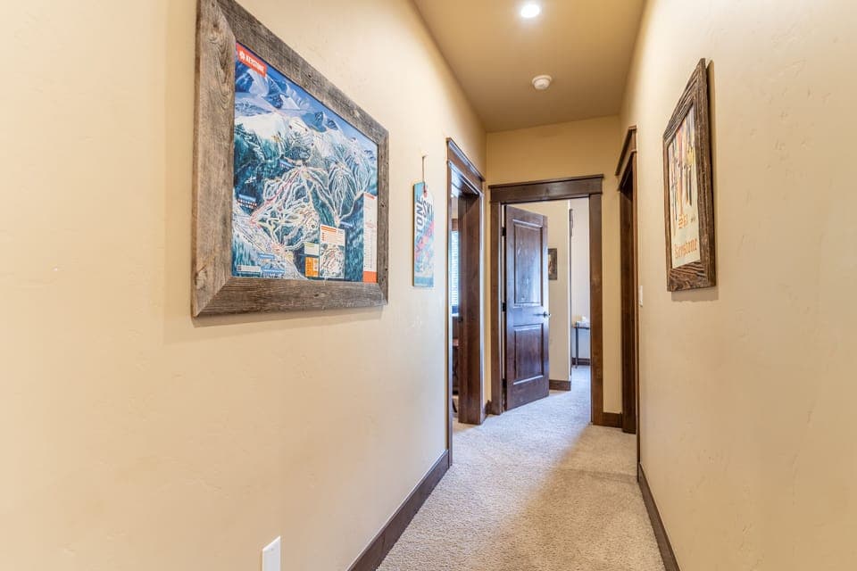 Hallway to the bedrooms on the lower level.