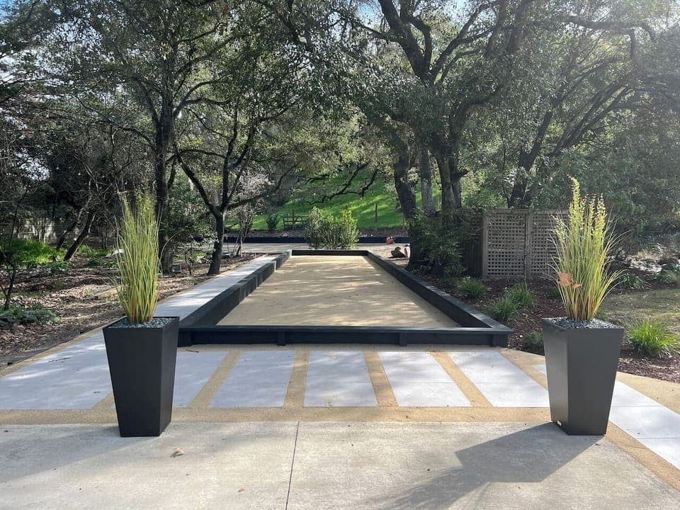 This oasis has over an acre of flat land for playing! Bocce court, pool table, outdoor dining, bar and grill pavilion, and a gas-heated pool and spa.