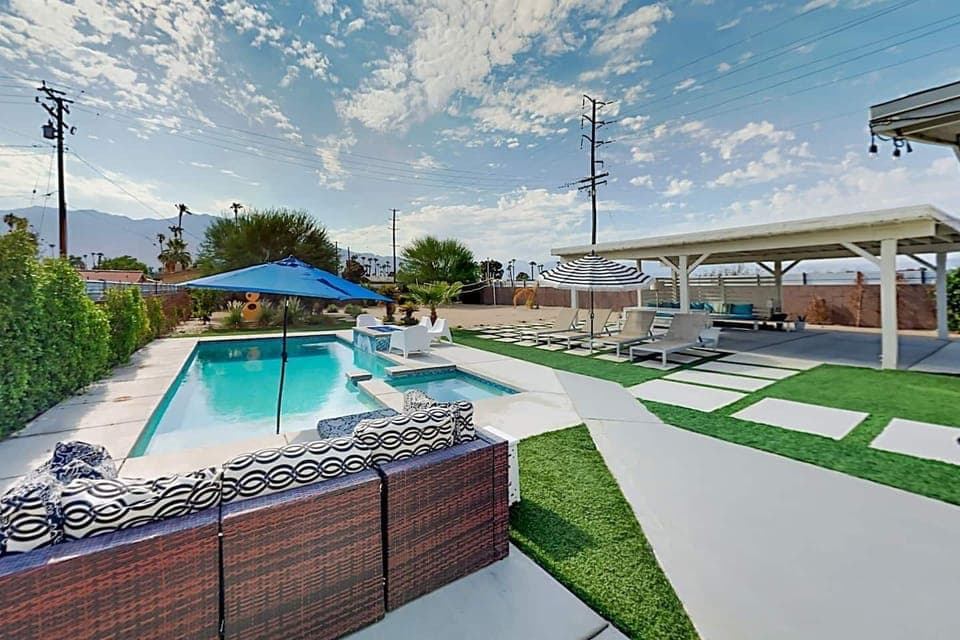 Gorgeous pool and spa with mountain view, multiple seating area options