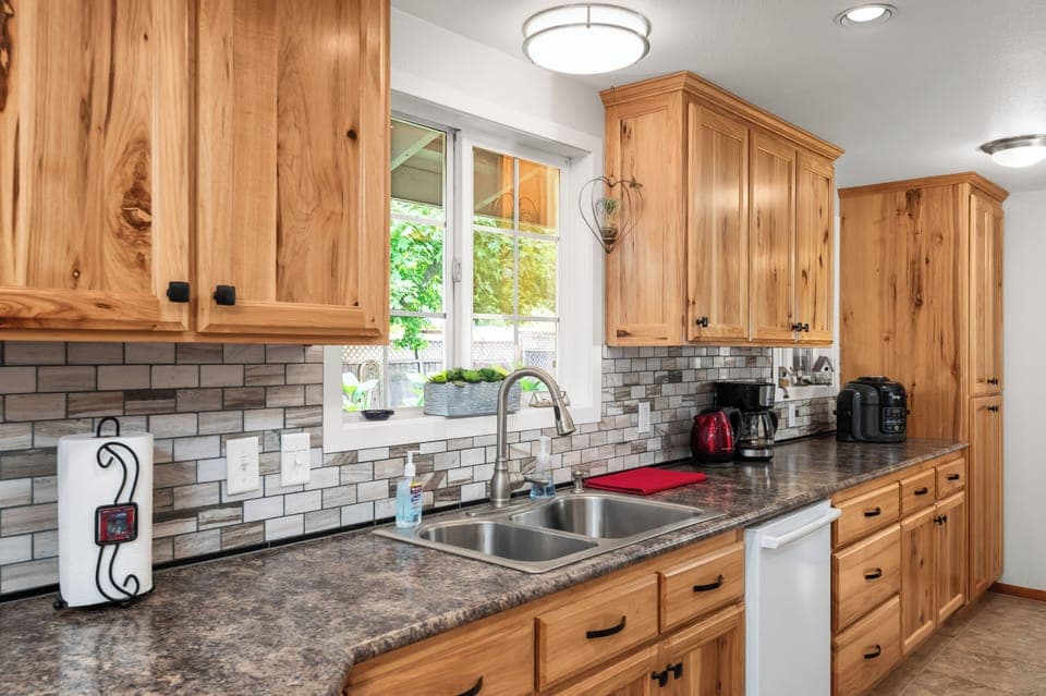 Kitchen: Dishwasher, gas range/oven, air fryer, coffee maker, microwave, etc. 