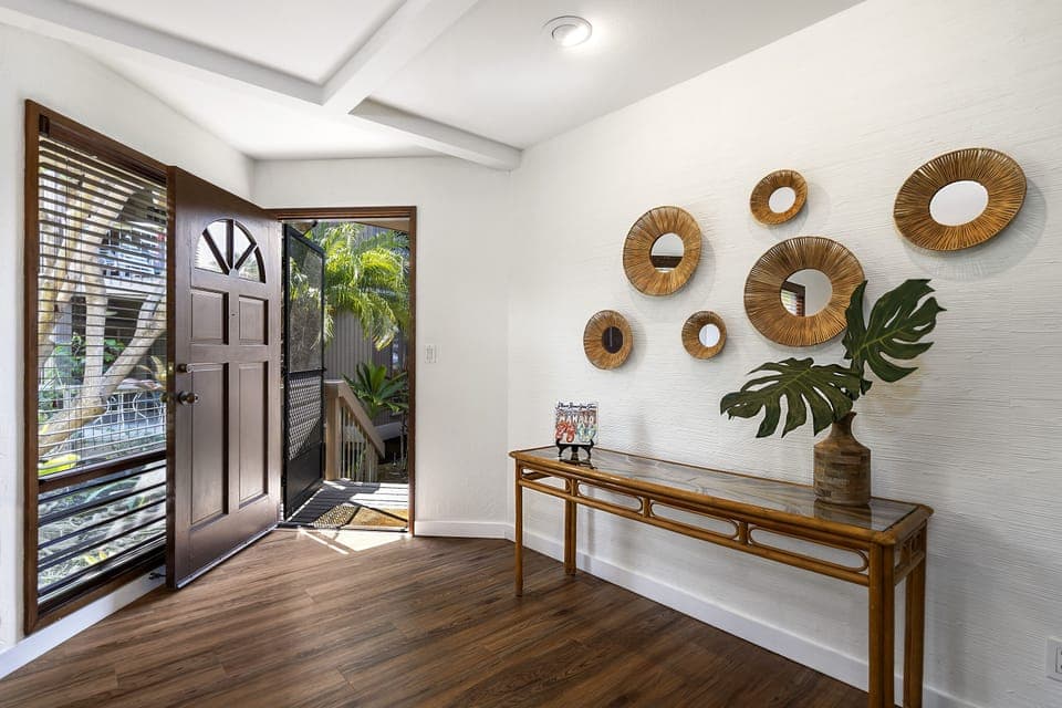 Welcoming entry with island-style décor sets the tone for a relaxing and memorable stay.