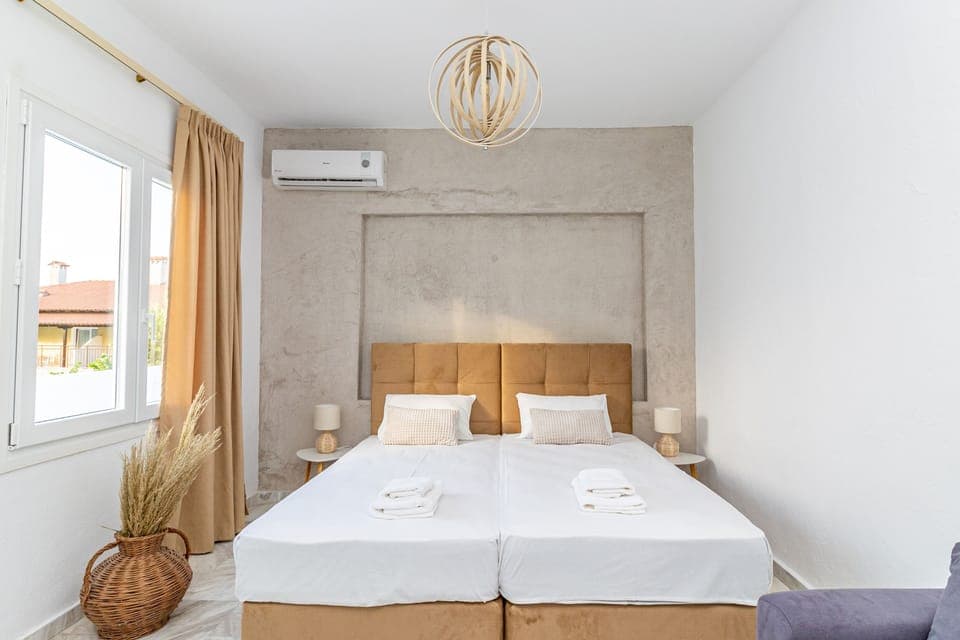 Junior Triple Room, 1 King Bed with Sofa bed, Lanai, Garden View | In-room safe, desk, free WiFi