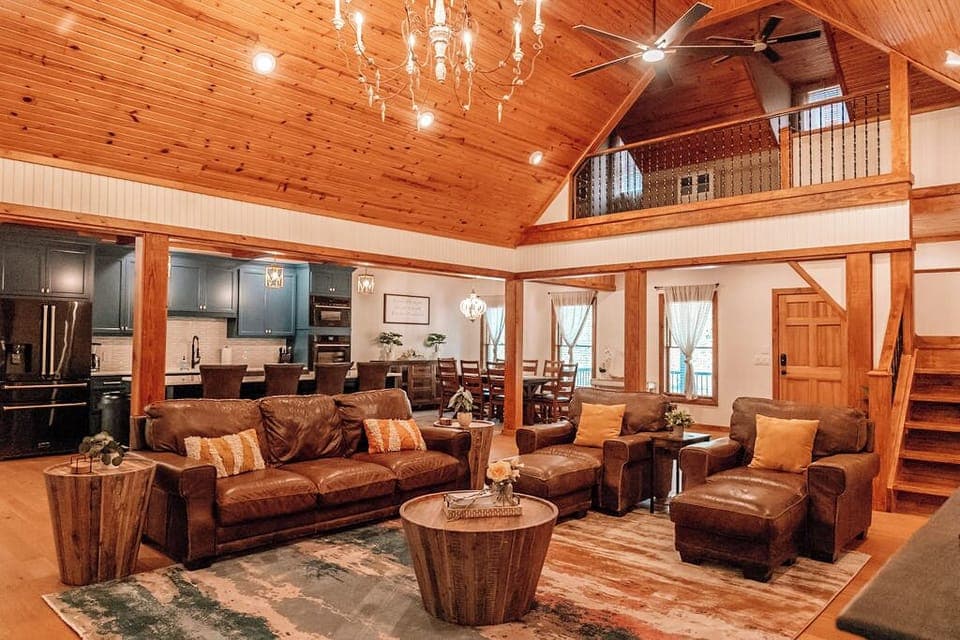 Main living room area open to the kitchen, great space for hosting large groups.