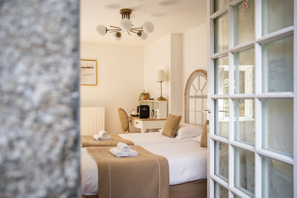 Twin Room | Blackout drapes, iron/ironing board, free WiFi, bed sheets