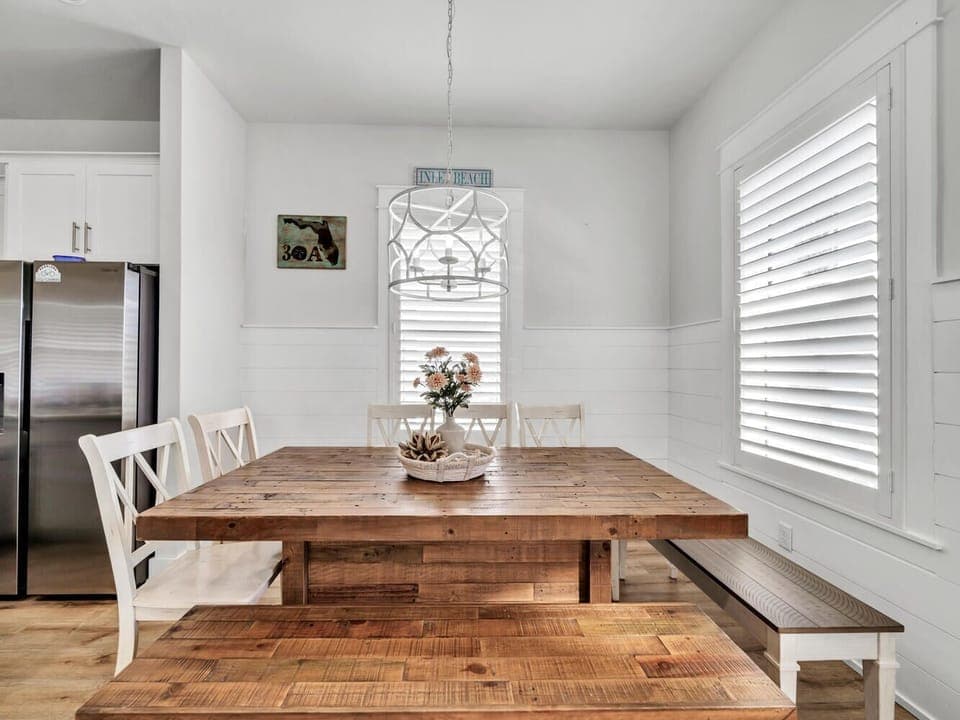 Our large dining room table seats 10-12 with 3 barstools at the island for additional seating.