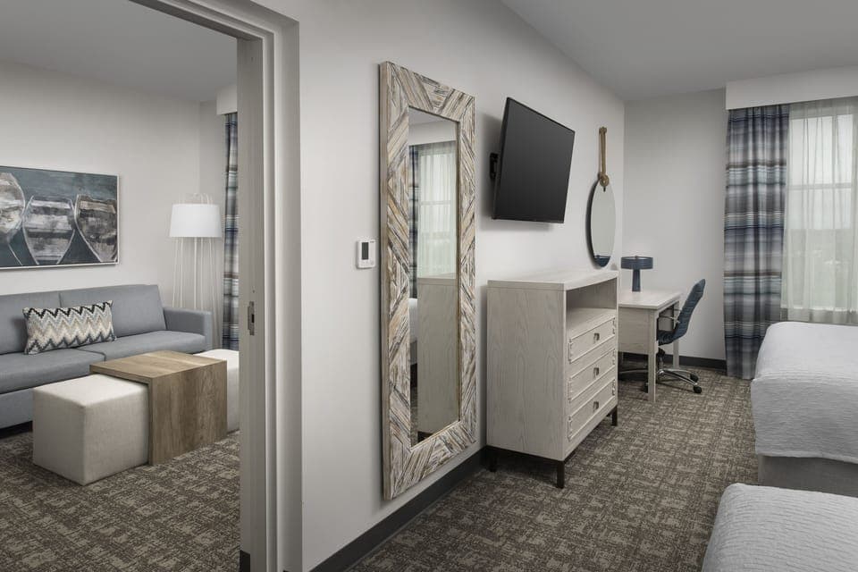 Studio Suite, 2 Queen Beds | Laptop workspace, iron/ironing board, bed sheets