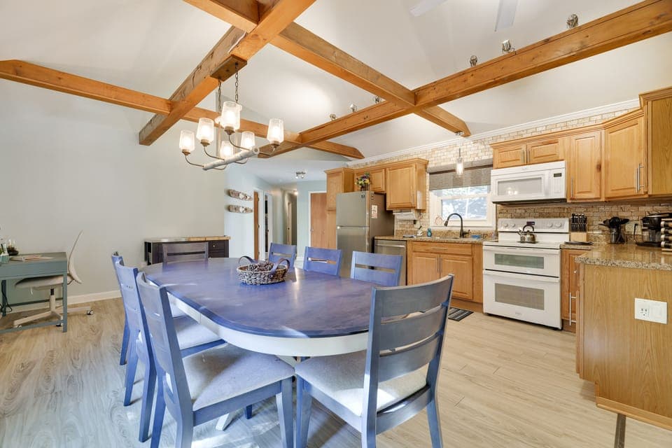 Massive kitchen space- all modern, rolling island and all you need to prep!