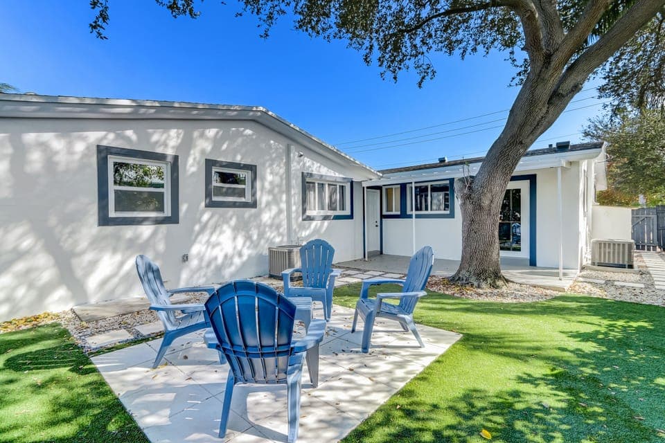 Expansive backyard features a putt-putt golf course