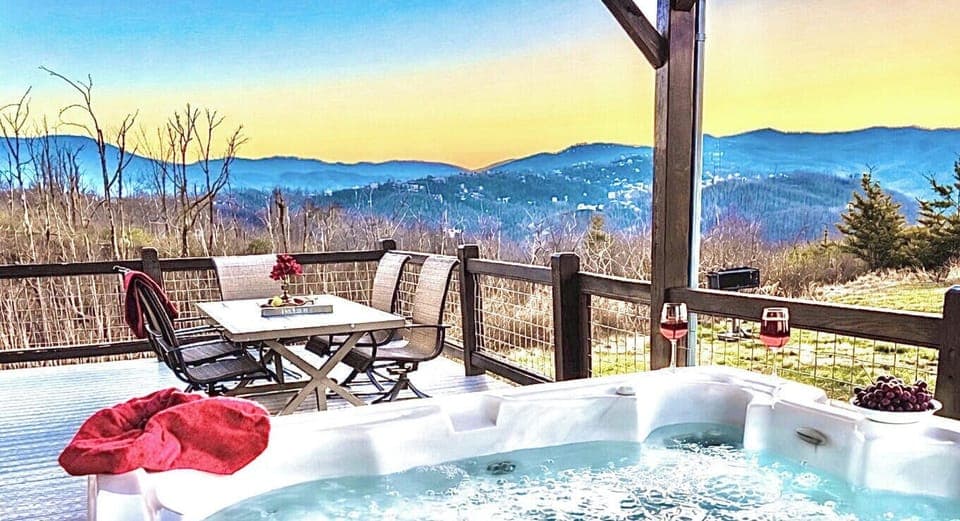 Hot Tub Retreat: Soak it up with stunning mountain views and evening sips on your private deck!
