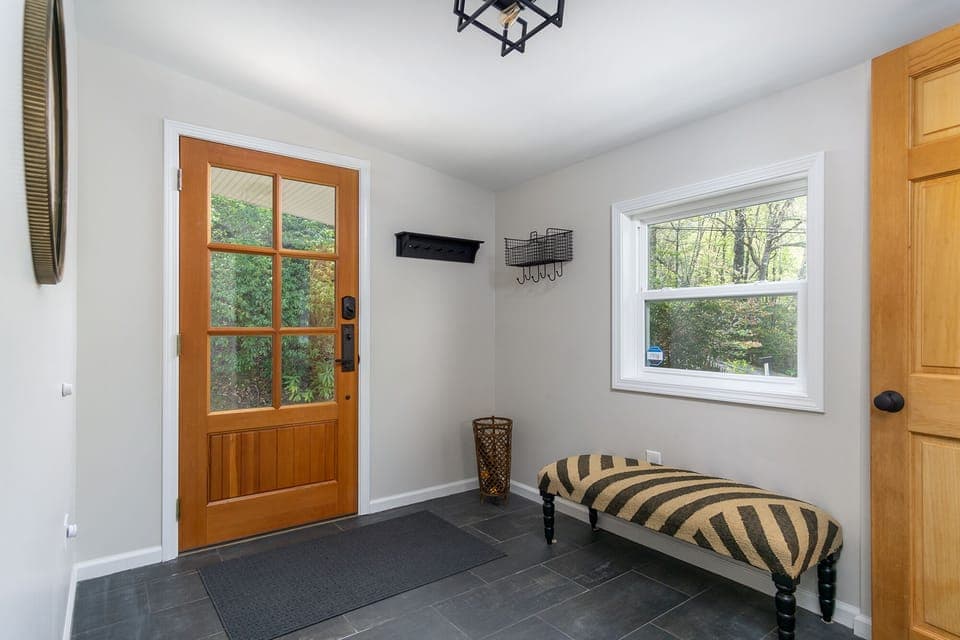 Main entrance with space for hanging coats and bags & kicking off your shoes for a relaxing stay.