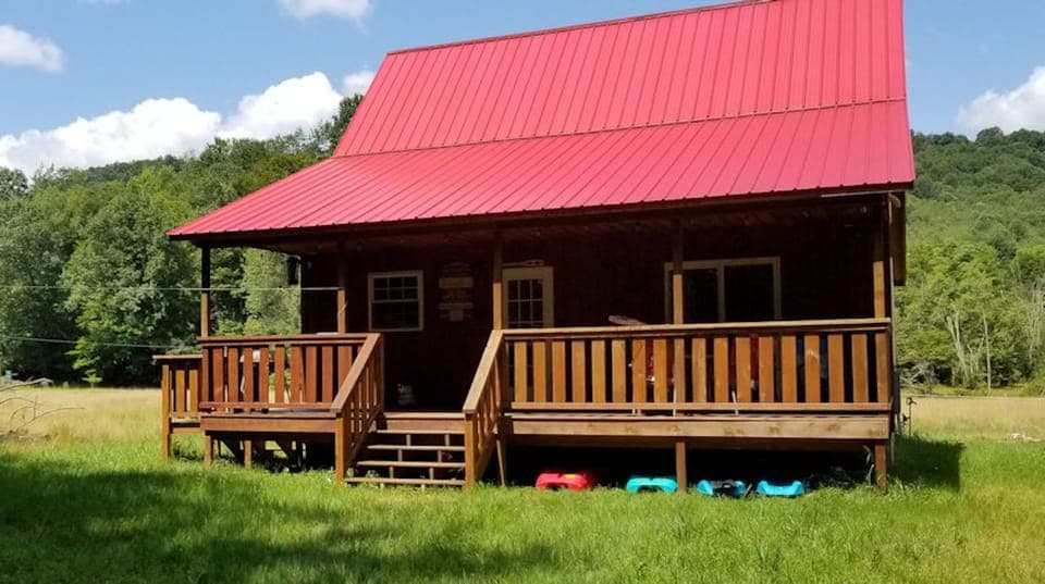 A large rear porch directly off the kitchen with plenty of sitting room.