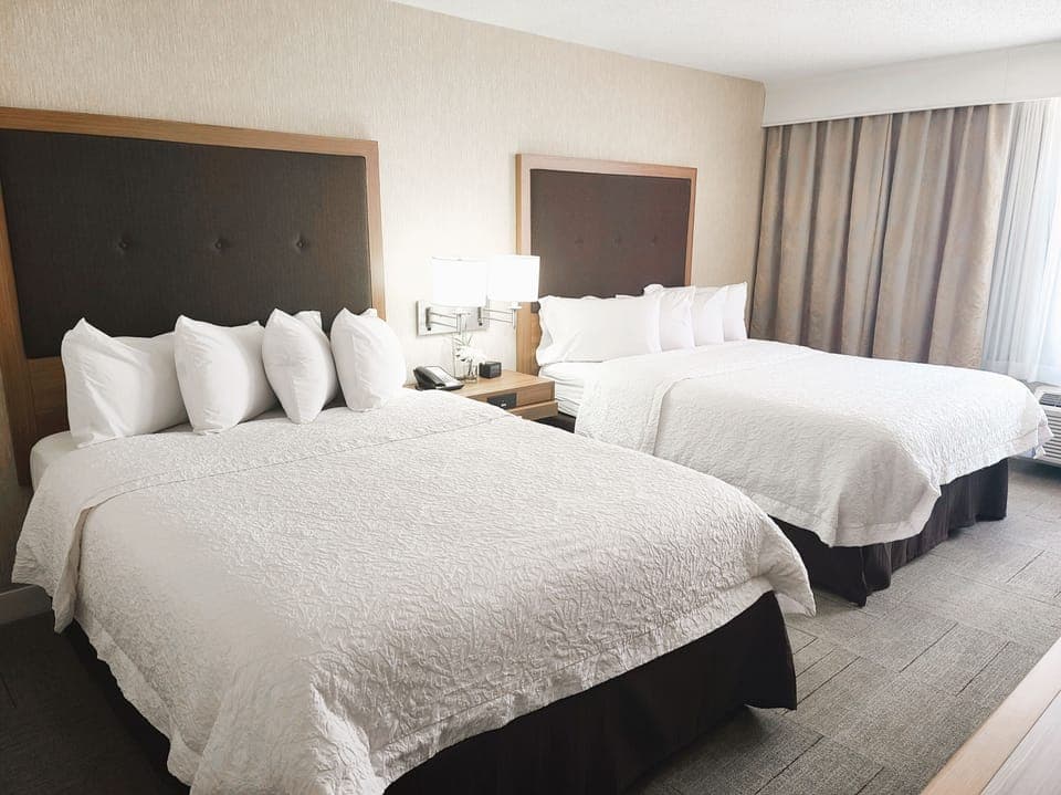 Premium bedding, pillowtop beds, desk, laptop workspace