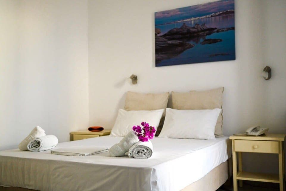 Feel at home in our thoughtfully designed bedroom, blending comfort and elegance with soft textures, natural light, and stylish local touches.