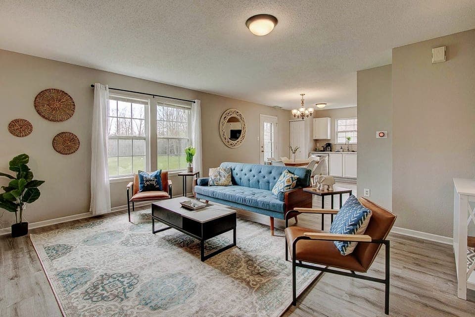 The couch has been updated from the one in this picture to a plush velvet couch.