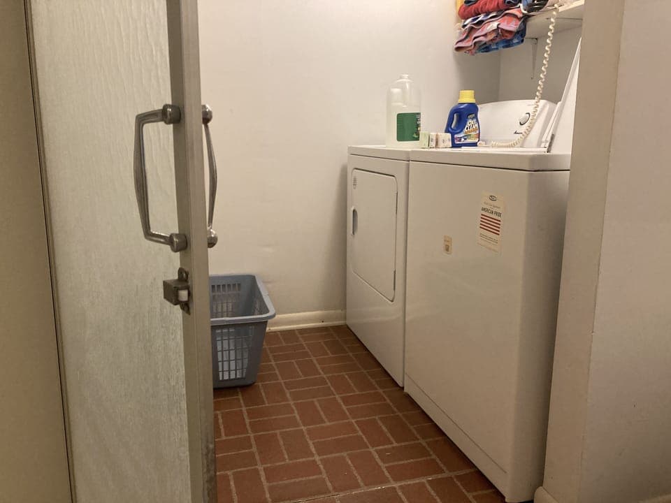 Full bath with laundry room. 