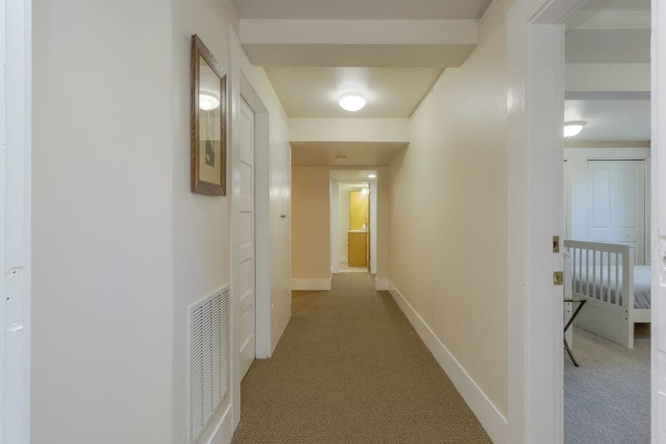 Downstairs hall to additional living space
