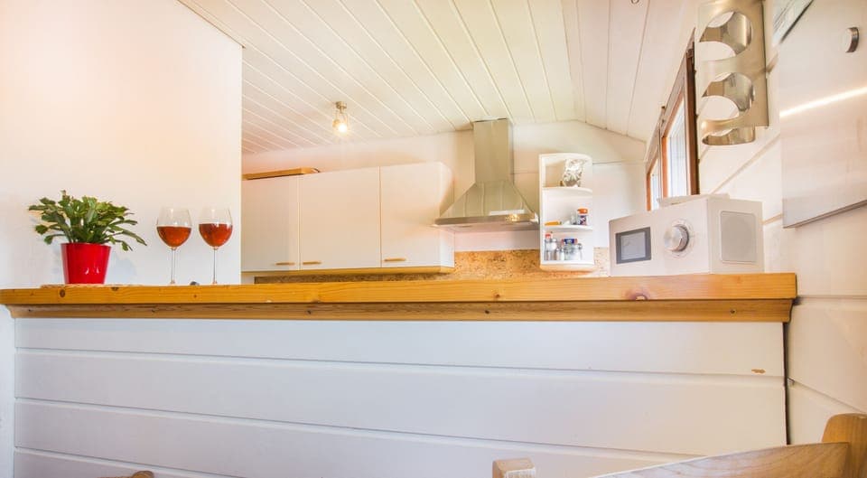 a red wine at the bar with a magnificent view of the valley