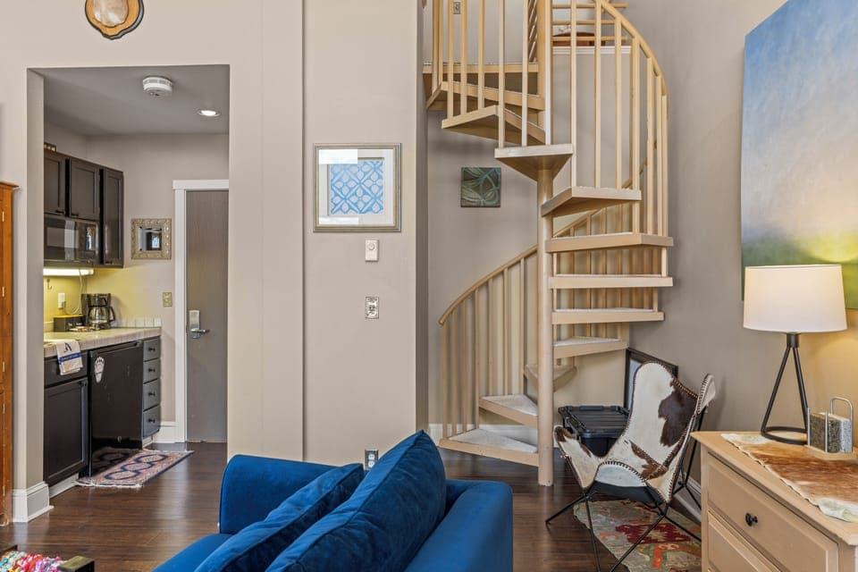 Spiral stairway to the loft.