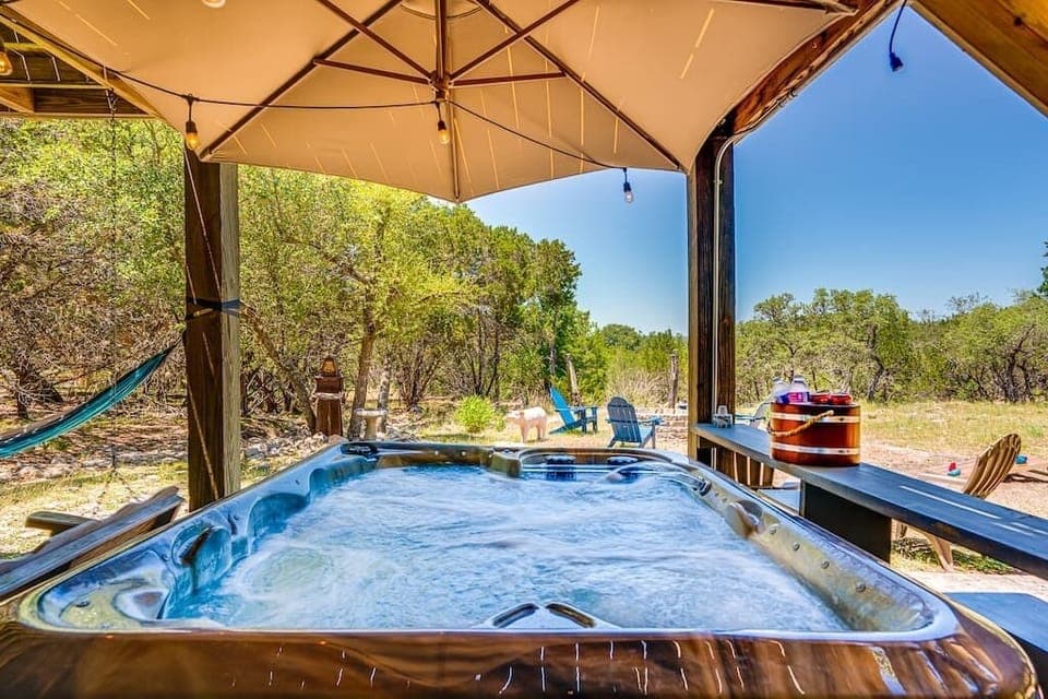 Downstairs hot tub that overlooks the nature preserve.