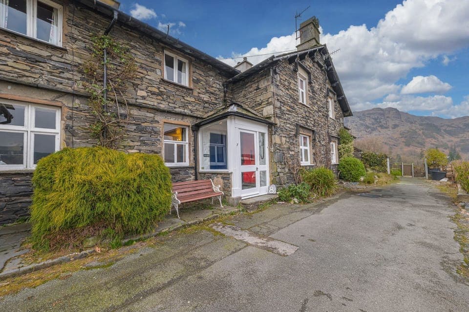 Rose Bank Cottage in Coniston with Lake District fells beyond