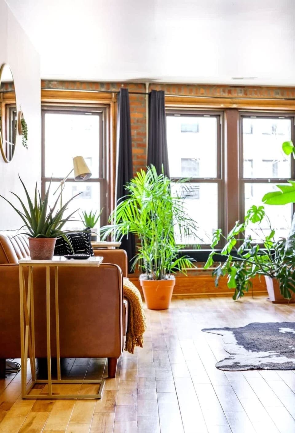 This space invites connection and comfort with its earthy tones, curated textures, and thoughtful design