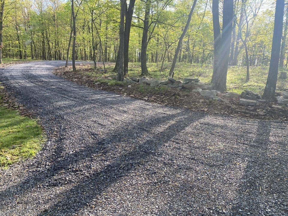 driveway that wraps around-plenty of room to bring a boat in and out