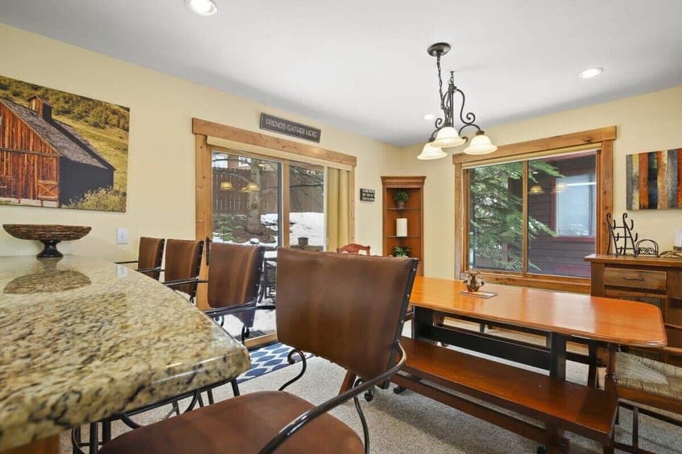 The view from the bar, with its seating for four, and beyond to the dining area with a dining table that can accommodate six.