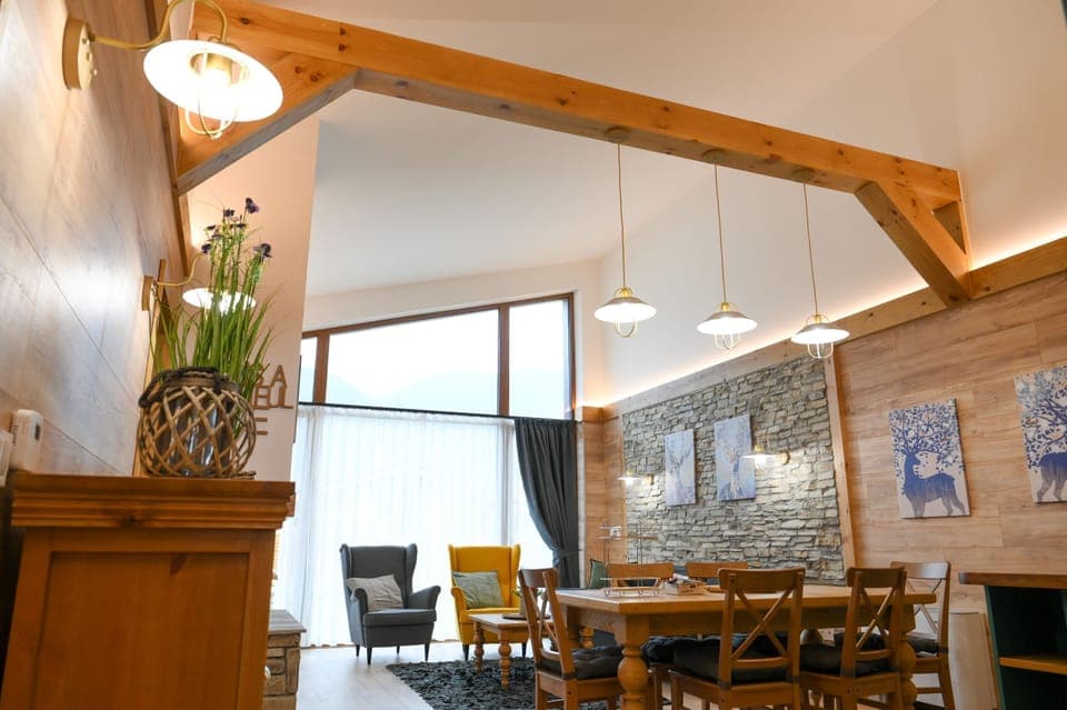 Deluxe Chalet, 3 Bedrooms, Sauna, Mountain View | Living area | 100-cm TV with satellite channels, fireplace