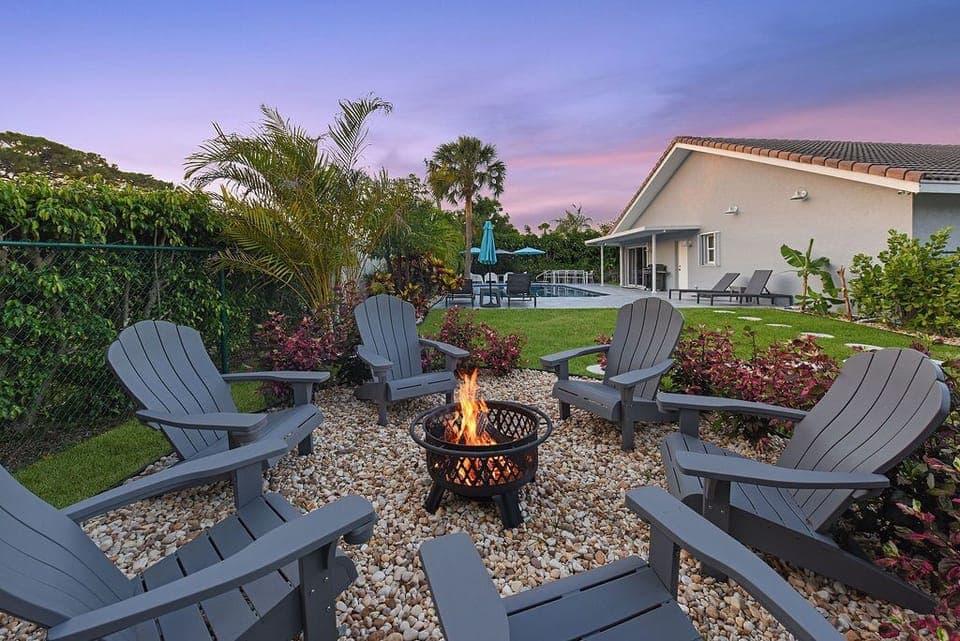 Fire pit makes evenings a pleasure in this large, private yard.