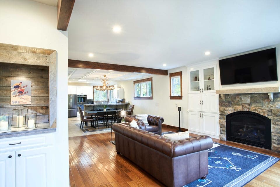 Large living room and dining room, open to kitchen.  Gas fireplace.