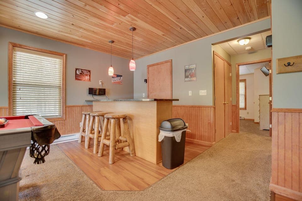 Lounge around the downstairs game room and kitchen area!