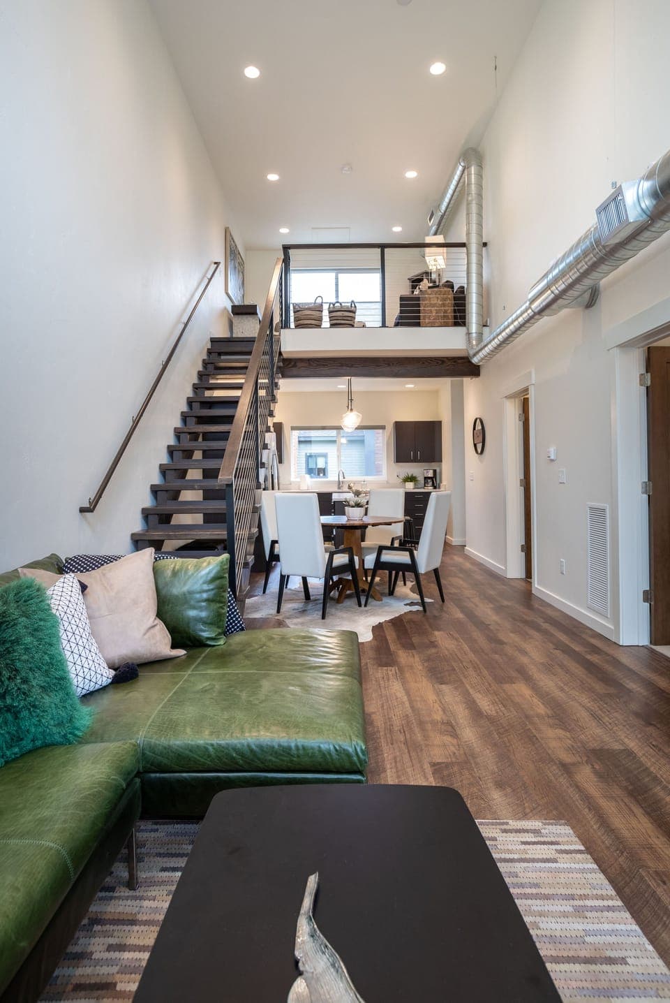 The open-concept living area is perfect for entertaining guests | Main Level