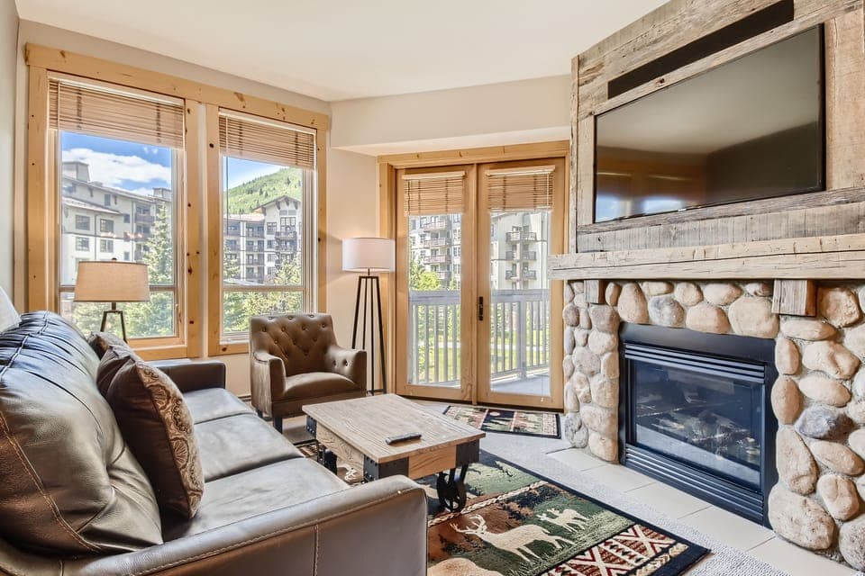 Built in Flat Screen TV into custom reclaimed barn-wood Fireplace Mantel