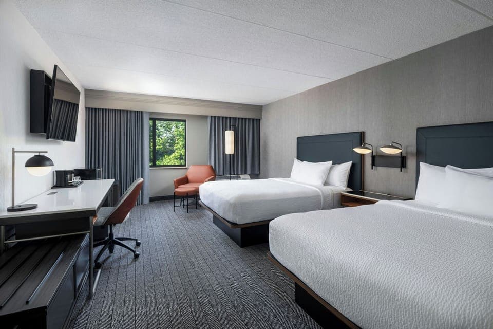 Premium bedding, memory foam beds, in-room safe, desk