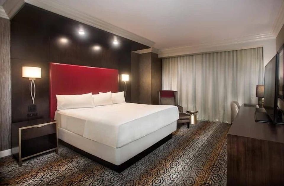 Room Type Assigned on Arrival | In-room safe, desk, blackout drapes, iron/ironing board