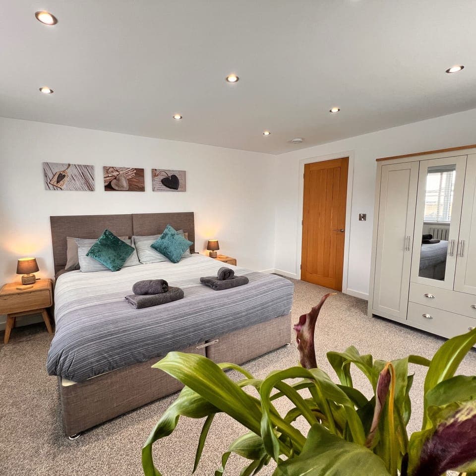 Our second bedroom has the option of being set up as a Super-King bed, or can be split down to two singles if this suits your group better (NB: if you are booking last minute & the bed configuration is important, please check with us before confirming the booking)