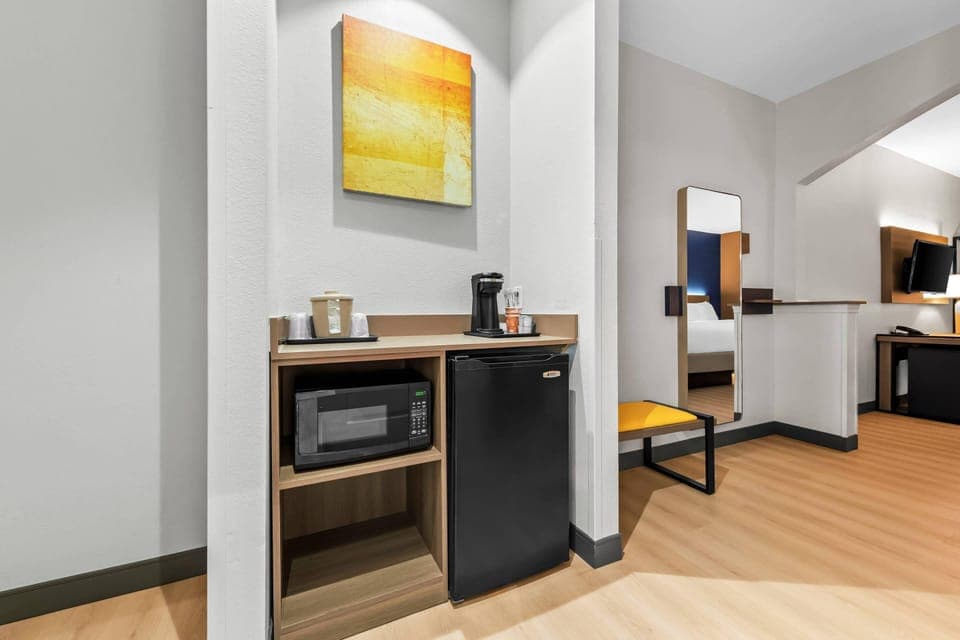 Suite, Non Smoking | 1 bedroom, desk, laptop workspace, iron/ironing board