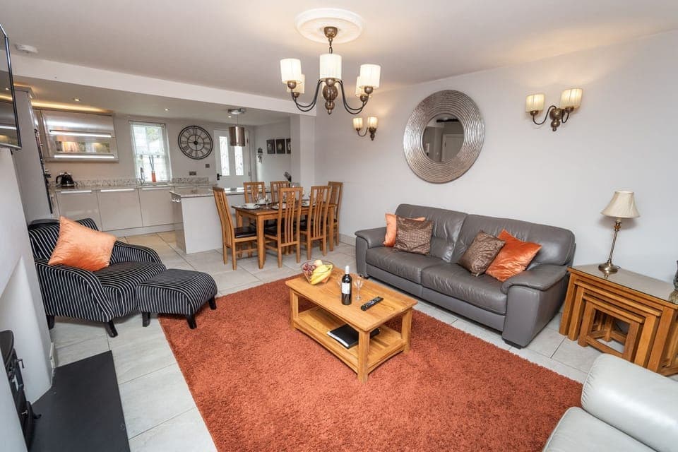 The ground floor apartment has a lovely spacious open plan living, dining and kitchen area