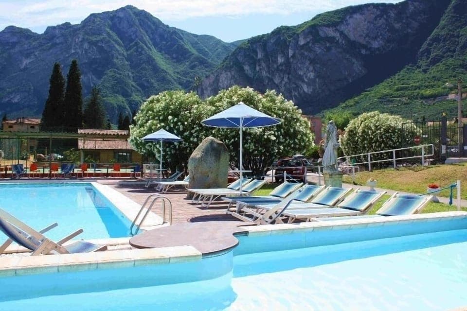 Outdoor pool, pool umbrellas, sun loungers