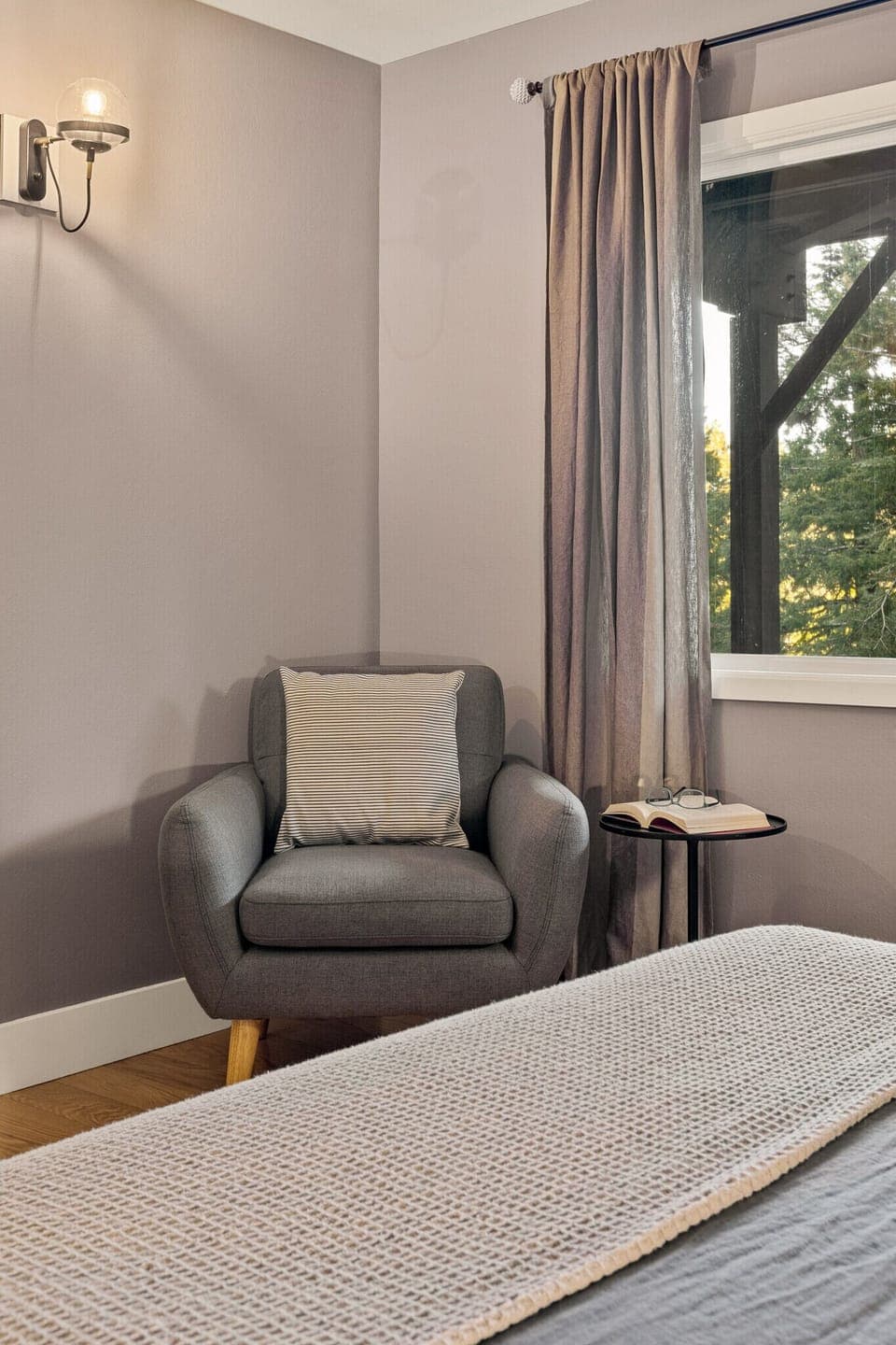 Bedroom 1: Settle in with a good book before you drift off to sleep in this quiet natural setting.